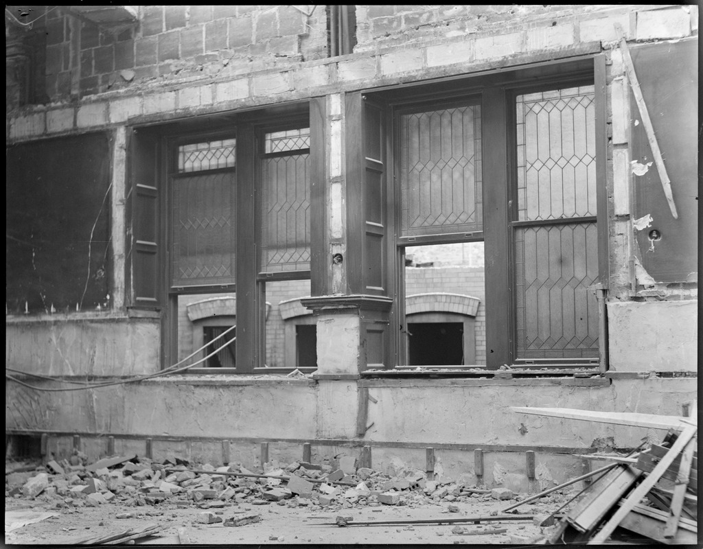 Leaded windows of Adams House dining room during demolition. Was located on Mason St.