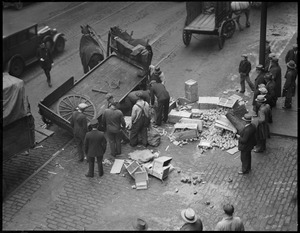 Horse-drawn produce cart spills contents in Market District