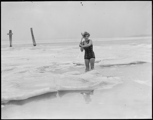Irene Hesenuis takes dip in icy water at Orient Heights, East Boston