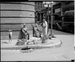 Couple selling vegetables at corner of Prince St. & Salem St. in the North End