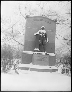 Wendell Phillips statue covered with snow