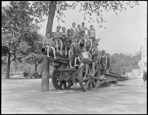 Kids pose on captured German gun on Common