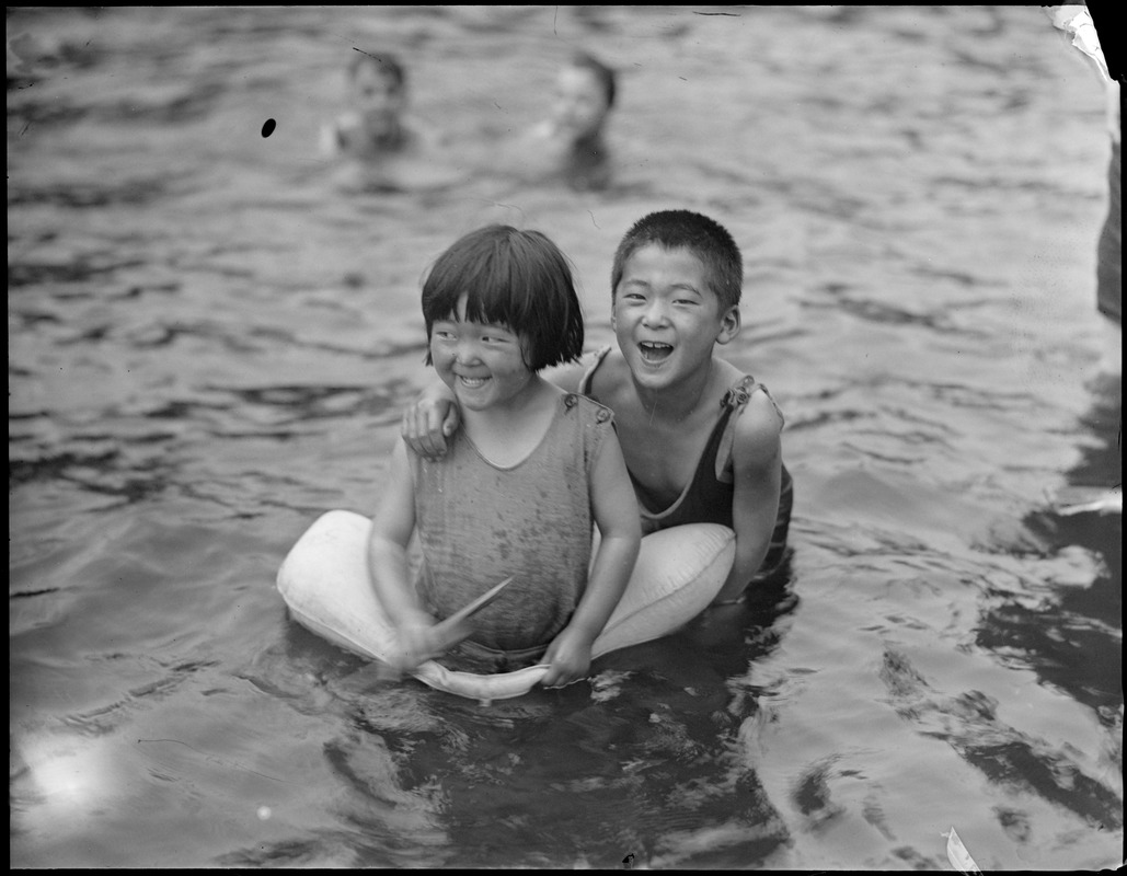 Children in the frog pond on the Common (Chinese children)