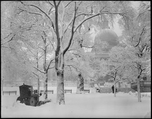 Tractor clearing snow on Common, in front of State House