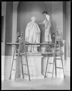 State House statue - John A. Andrew statue being cleaned up in State House by Robert J. Guthrie. Andrew was Gov. of Mass. way back in 1870