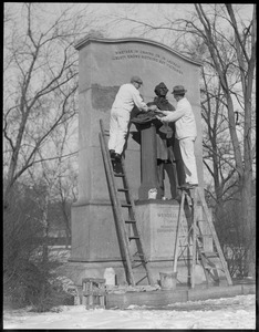 Cleaning the Wendell Phillips statue