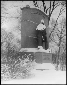 Wendell Phillips statue at night: snowbound Public Garden
