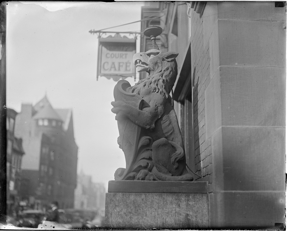 Stone griffin in front of Trinity Court at 175 Dartmouth Street near Back Bay Station