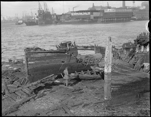 Boat graveyard at Chelsea Creek to be converted to a beach. Work started on Jan. 28, 1932, near Condon and Meridian Streets.