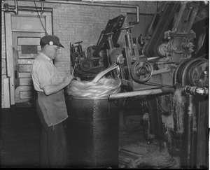 Charlestown Navy Yard/rope making. John Allen at the finishing machine that prepares for spinning.