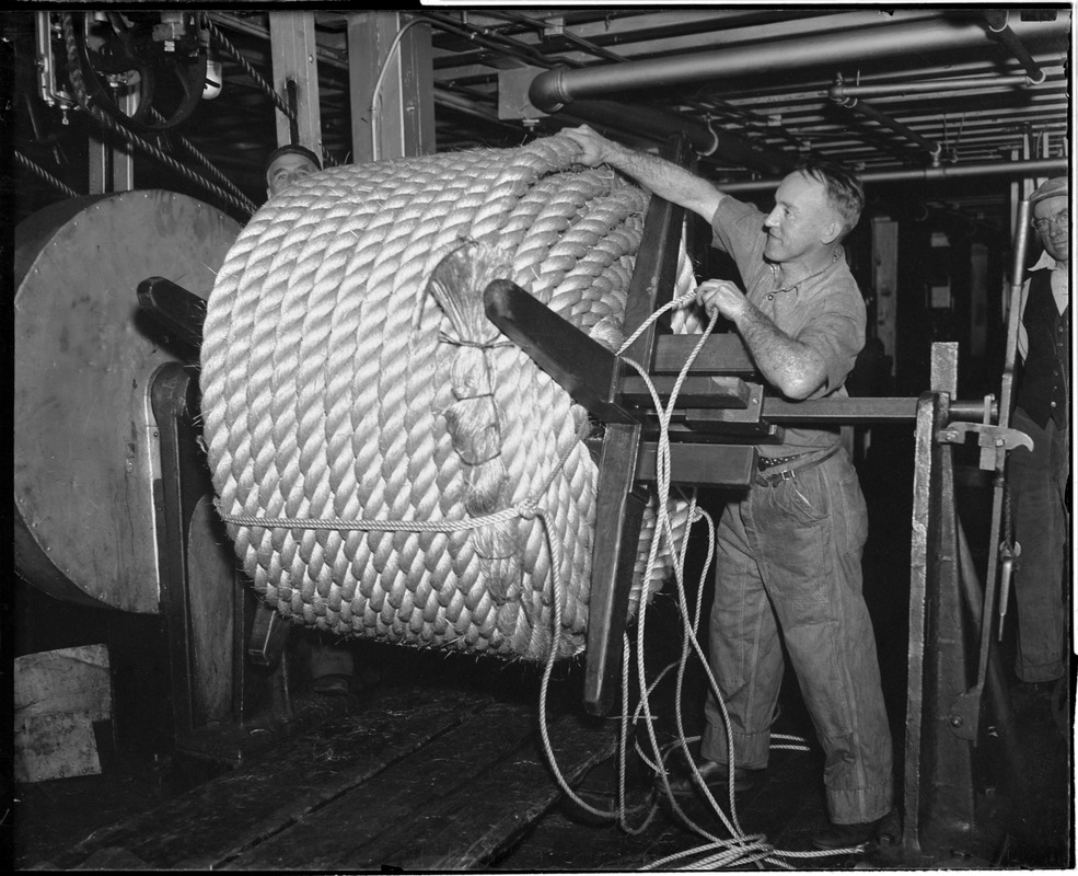 James J. Lee binding coil of 7" Hawser that has just been completed in ropewalk, Charlestown Navy Yard