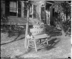Small concrete ship in front yard at 29 Charles Street, Dorchester