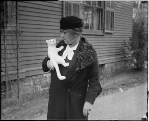 Mrs. Ralph Emerson holding her China "cat"