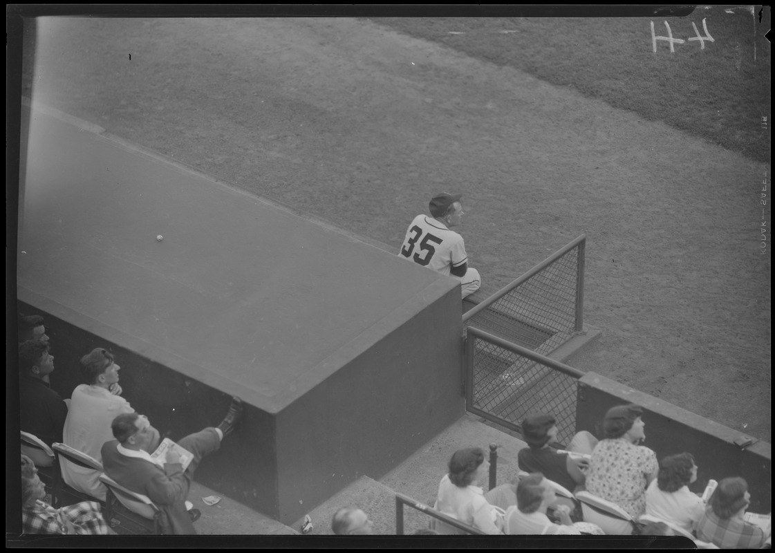 Athletics player no. 35 on dugout steps