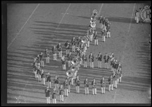 Harvard band forming music notes on field, Harvard vs. Brown