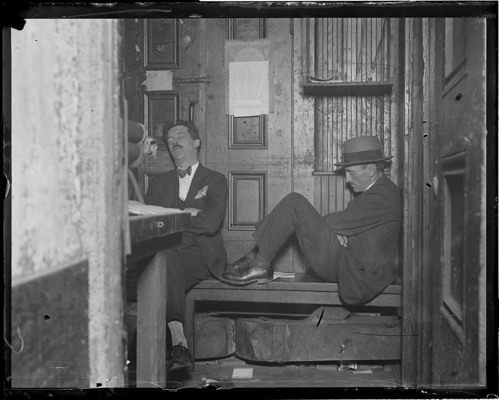 Newspaper cameramen resting in hypo row, Frank Dent, left, and Alex Machum