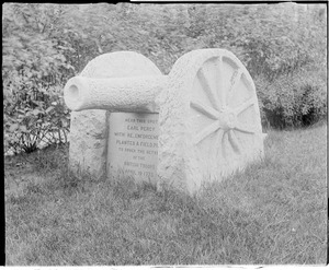 Lexington granite gun on lawn; old Concord, gun made out of stone