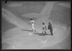 Ted Williams makes contact
