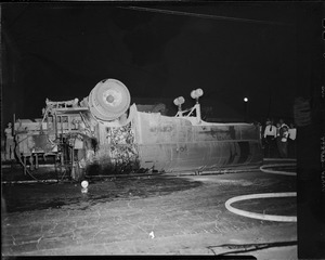 Tanker truck turns turtle