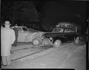 Cars collide on trolley tracks