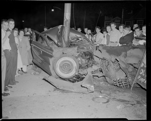 Taxi wrapped around pole