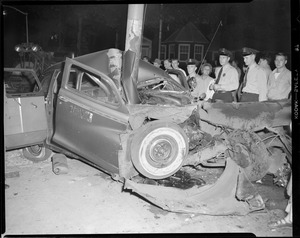 Taxi wrapped around pole