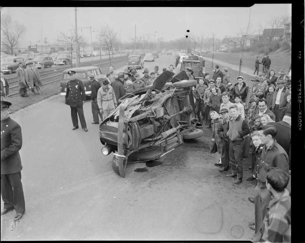 Wrecked auto near tracks