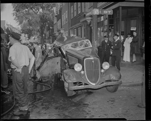 Wrecked auto at the corner of E. Eighth and I Streets, South Boston