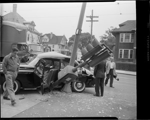 Truck hits car at the corner of Perkins Street and South Huntington Ave., Jamaica Plain