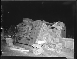 Truck carrying Oxydol flower pots overturns