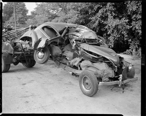 Wrecked auto towed