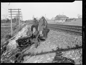 Auto wreckage near trackage