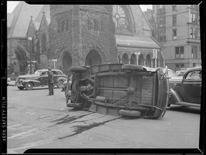 Overturned auto in Back Bay