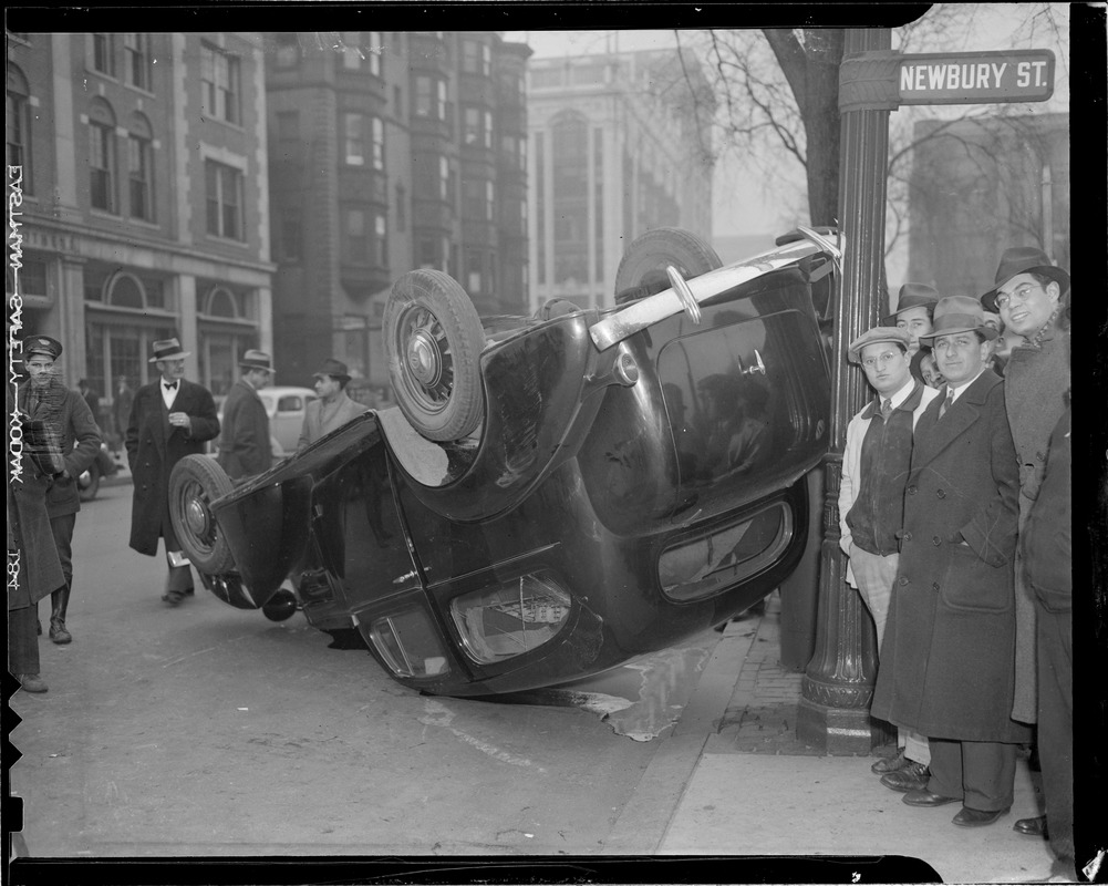 Auto driven by Richard Kent turns over at Newbury and Berkeley