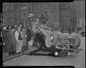 Auto driven by Richard Kent turns over at Newbury and Berkeley