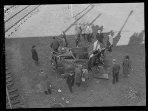 Auto driven by George J. Moccaldi plunges 50' from Prison Point bridge, Charlestown