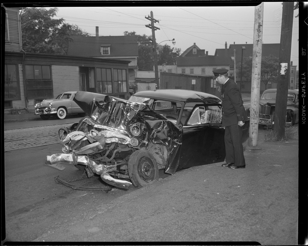 Wrecked auto on street