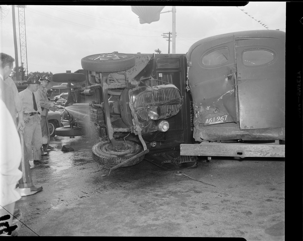 Railway Express truck on its side