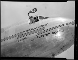 "Wrong Way" Corrigan waves from cockpit of American Airlines flagship Newark