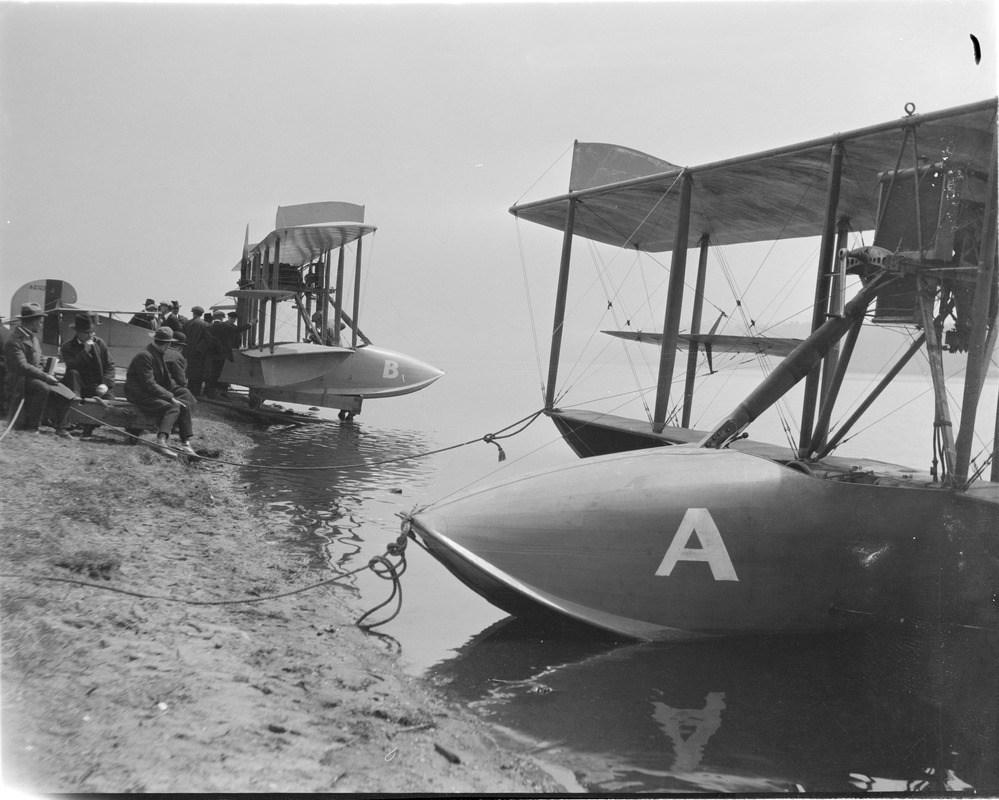 Curtiss flying boats on shore of Charles River