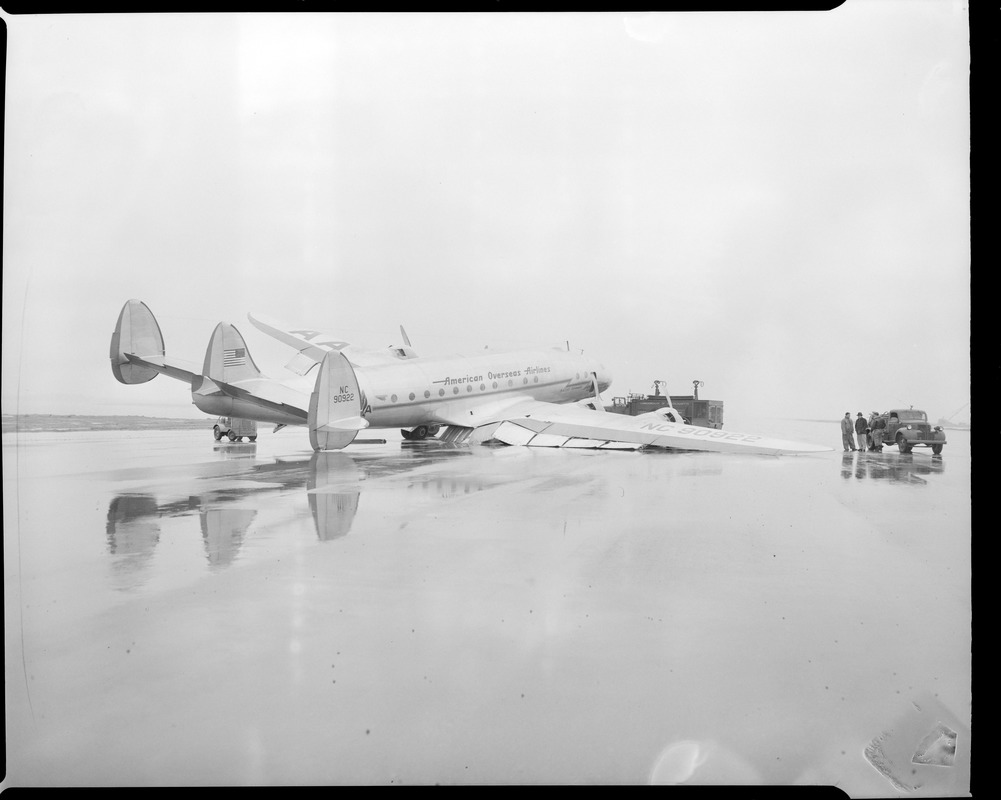 The Denmark, flagship of American Overseas Airlines, crash lands at East Boston airport