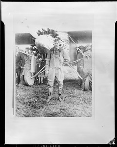 Capt. Charles Lindbergh shown standing in front of his Ryan monoplane Spirit of St. Louis Curtis Field, Long Island