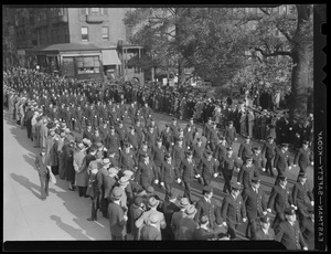 Police parade past State House