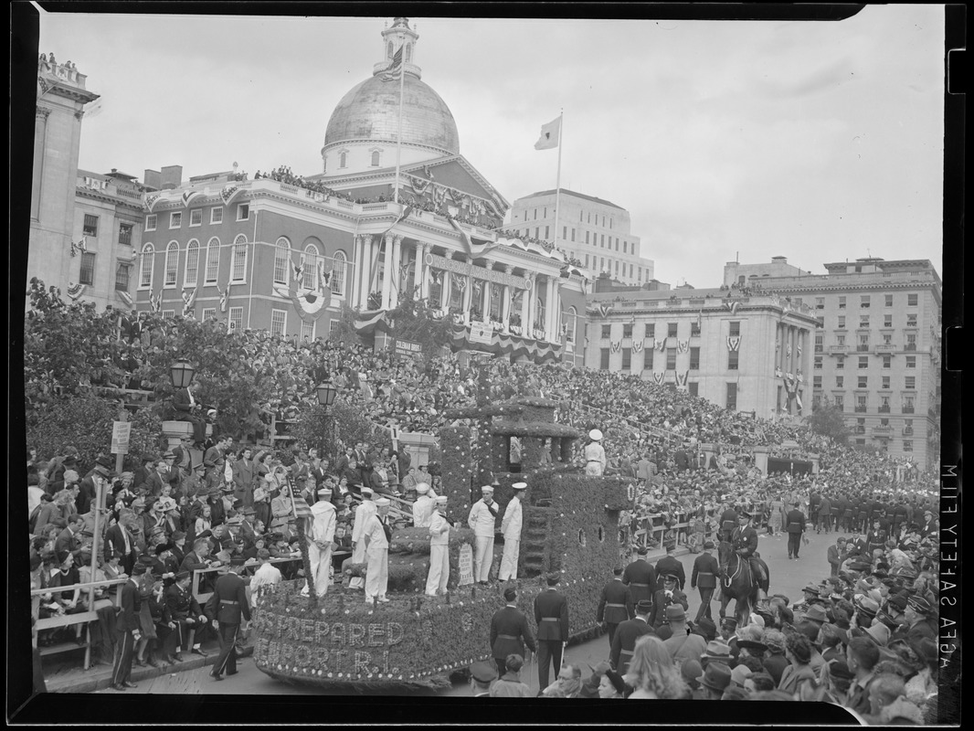 Floats in Legion Parade pass by State House