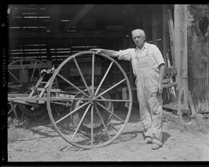 Farmer with harvester