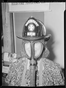 1 woman with mask & fire dept. hat on