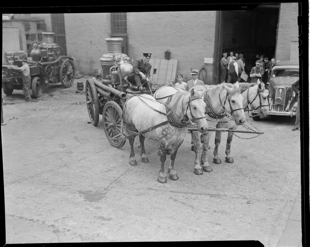 Old Waltham fire dept. steamer to be driven in parade today by Thomas Barret of the Bristol Street HQ