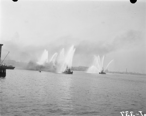 Fireboats showing off in harbor