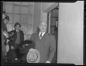 James Welansky, who was in charge the night of the Cocoanut Grove fire, enters state police HQ for interrogation