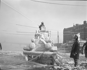 Iced up fire truck at fire near North Station